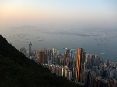 06A Sai Ying Pun district with Tsing Yi Island, Stonecutters Island and West Kowloon across Victoria Harbour just before sunset from Lugard Road Victoria Peak Hong Kong